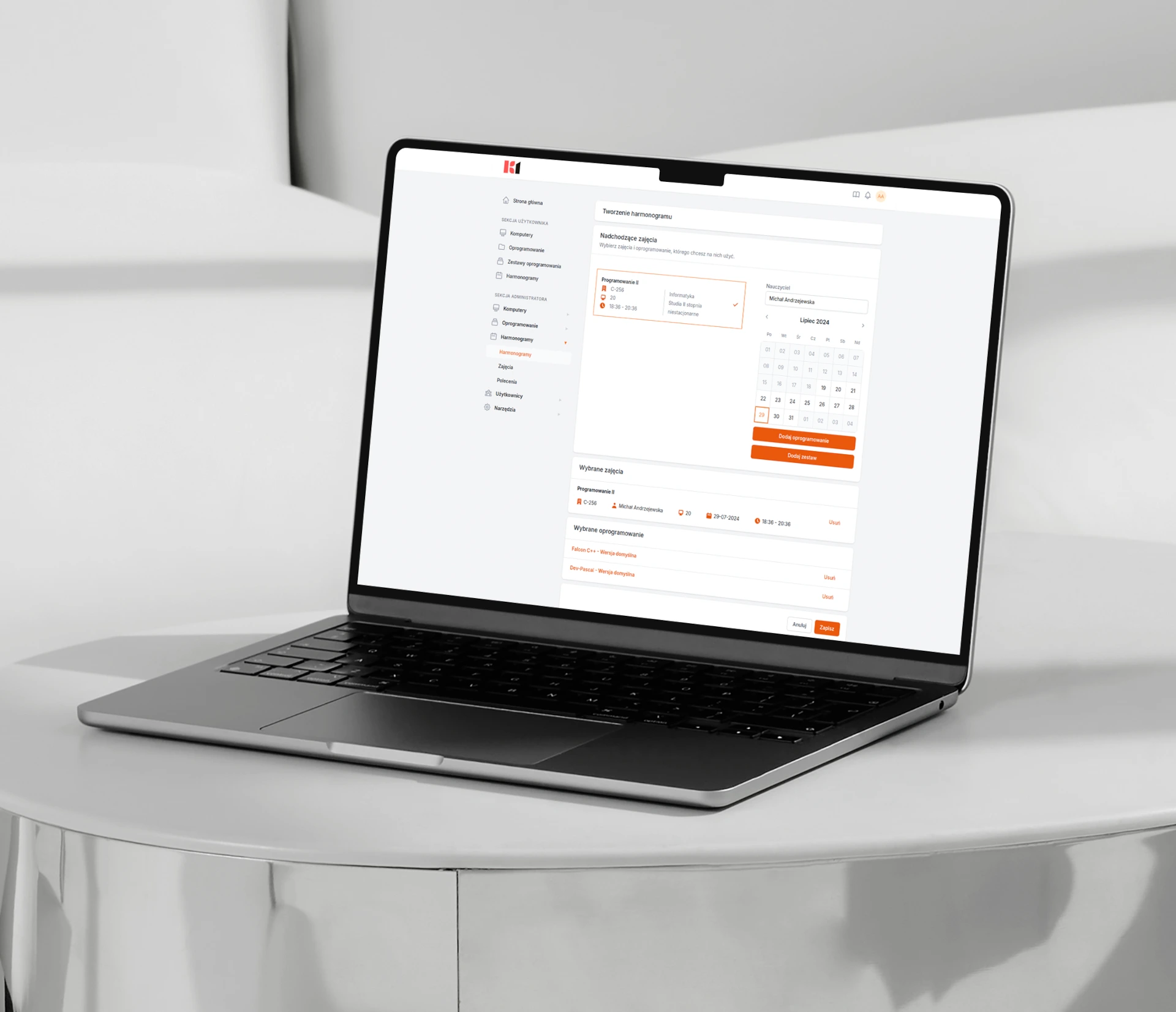 Screenshot showing K1 application on laptop - scheduling module.
